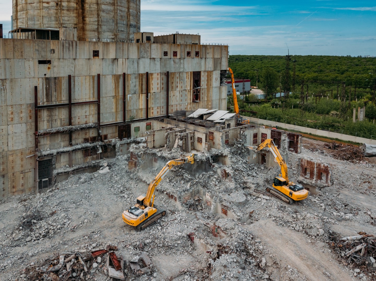 Aerial view of demolition site. Process of demolition of old industrial building.